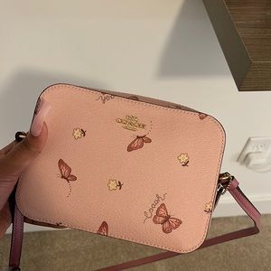 Coach pink butterfly crossbody bag